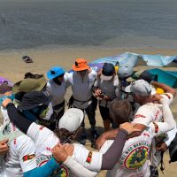 Team huddle before hitting the water